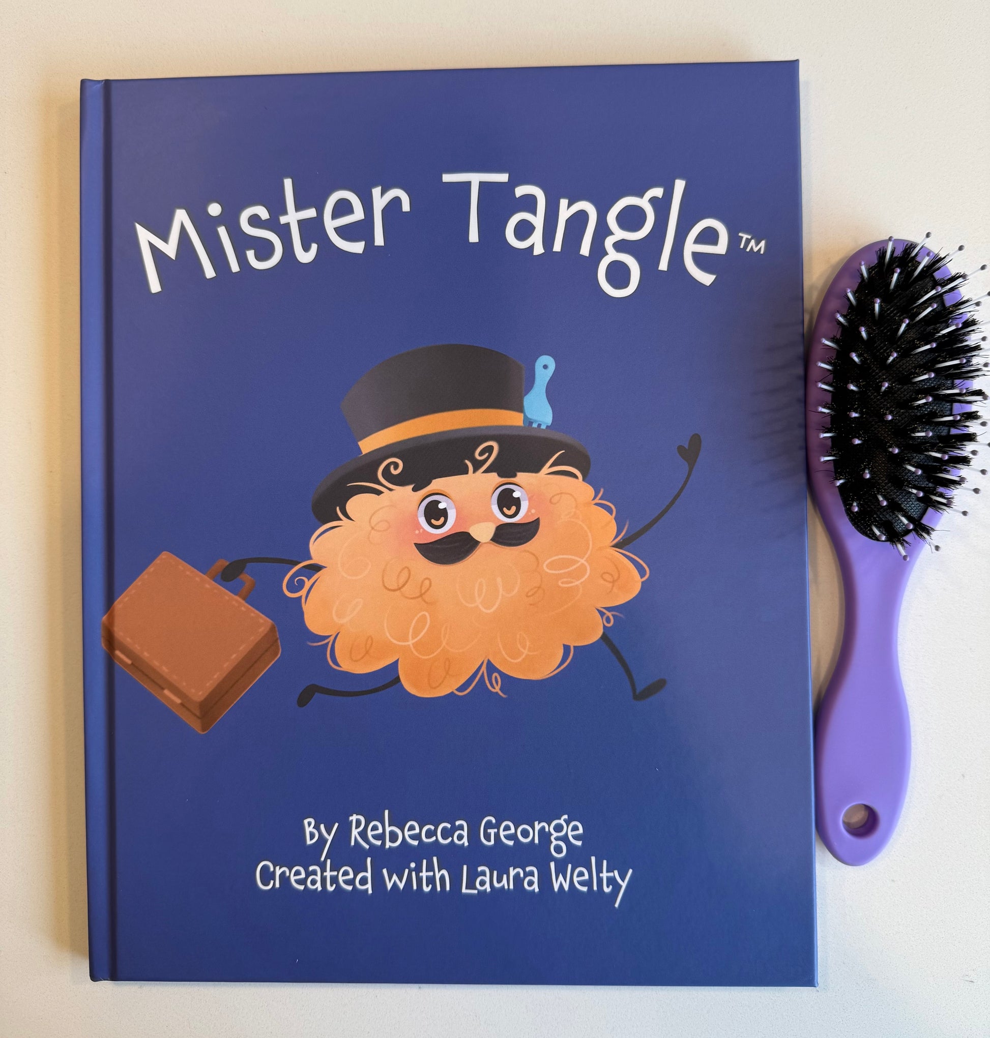 mister tangle book and brush